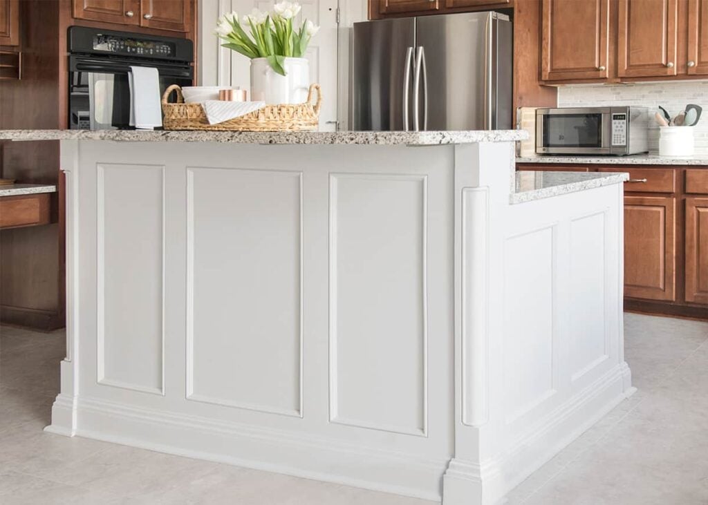 Kitchen island with trim and columns