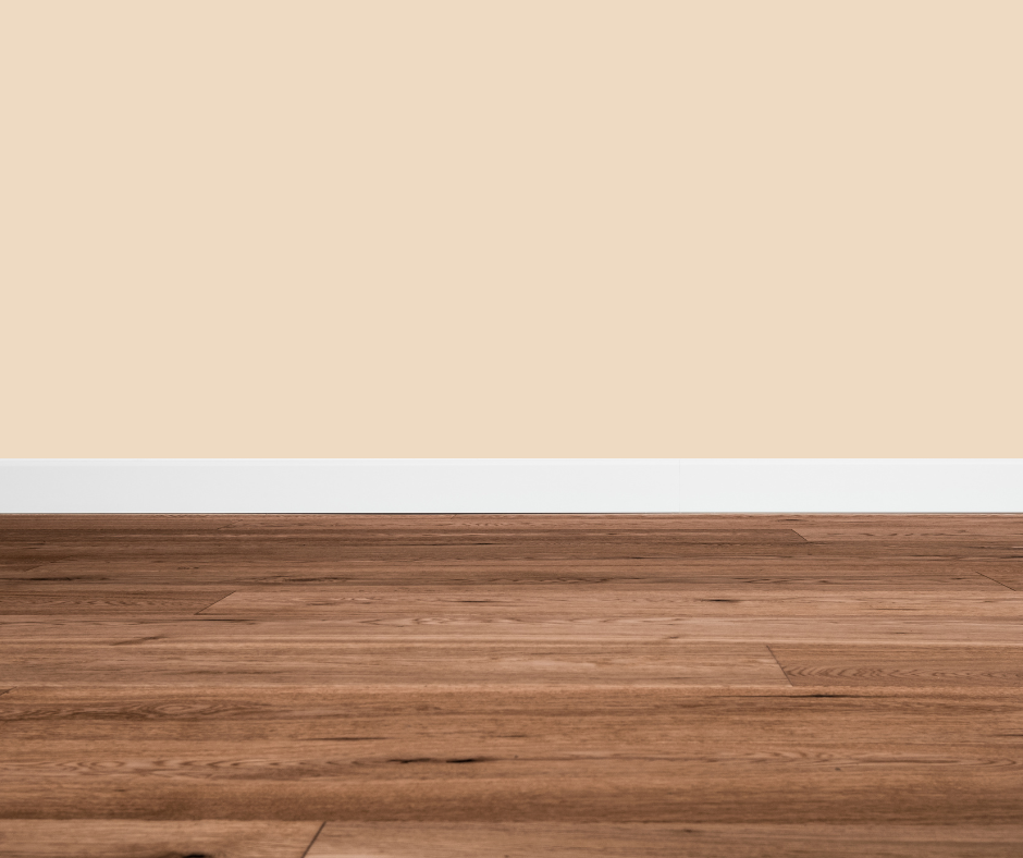 Warm beige walls with dark wood floors