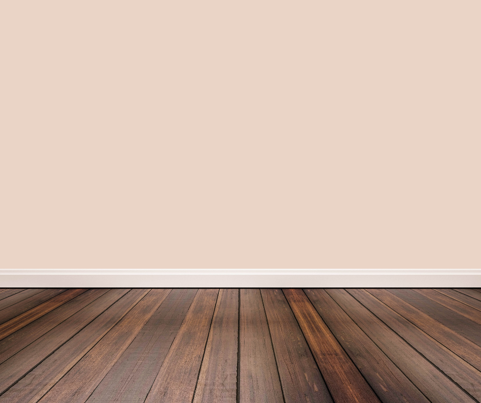Pink ground walls with dark wood floors