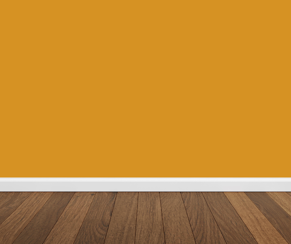 Spicy mustard walls with dark wood floors