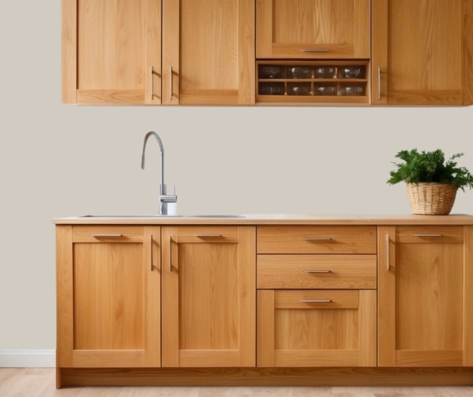 Agreeable gray walls in kitchen with honey oak cabinets