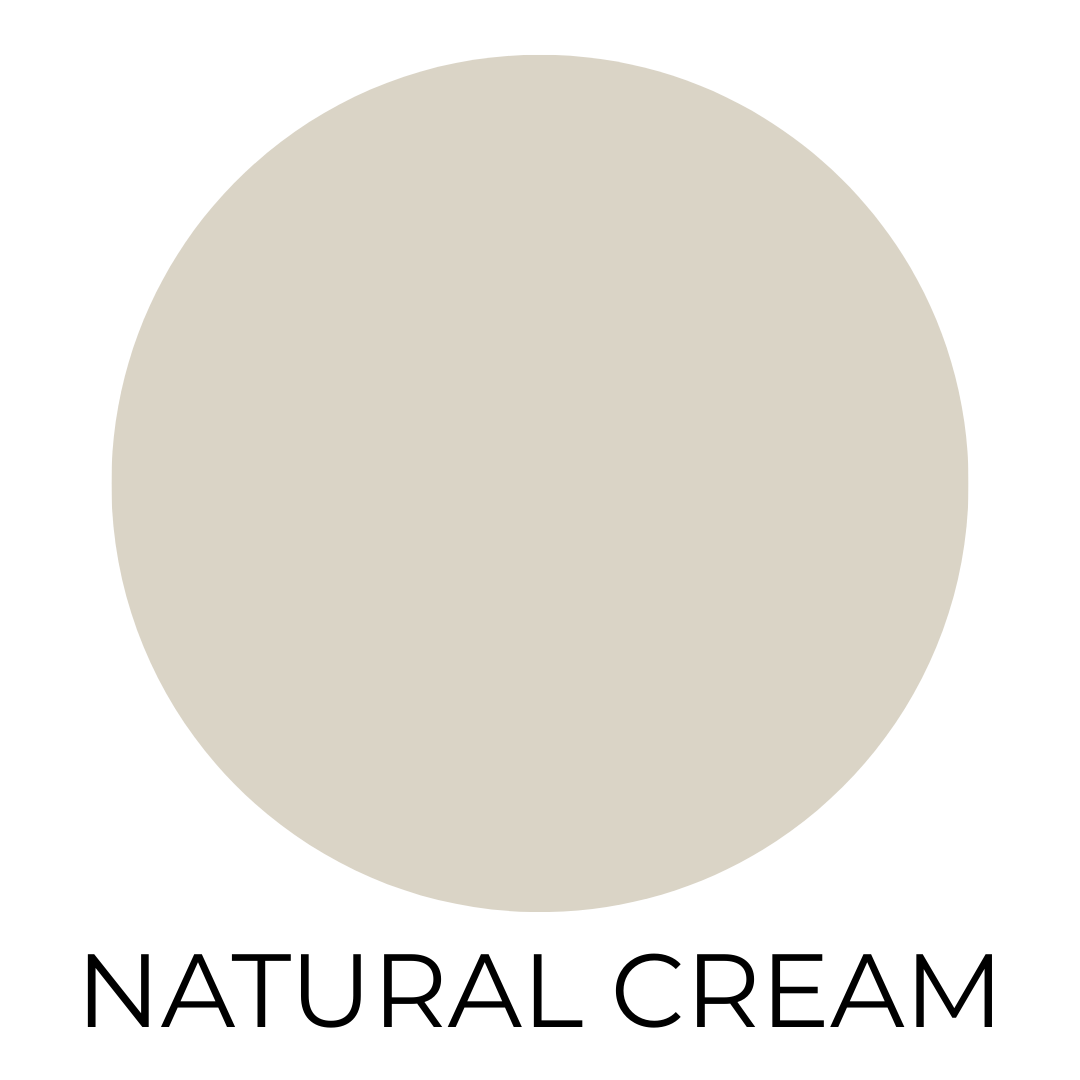 A digital paint swatch showing the color "Natural Cream" by Benjamin Moore. The swatch features a large circle filled with a soft, creamy greige tone that balances beige and gray. The background is white, and the name “NATURAL CREAM” is printed in clean black text underneath the circle in an all-caps, modern sans-serif font.