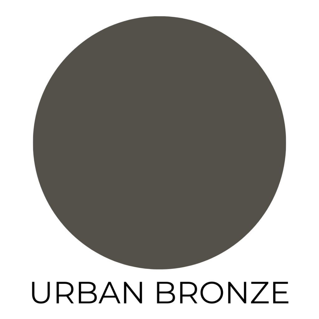 A digital paint swatch labeled “Urban Bronze” by Sherwin-Williams. The swatch features a large, solid circle filled with a deep, rich brown-gray color that has an earthy, almost charcoal undertone. The background is white, and the name “URBAN BRONZE” is centered below the circle in bold, black, all-caps sans-serif font.