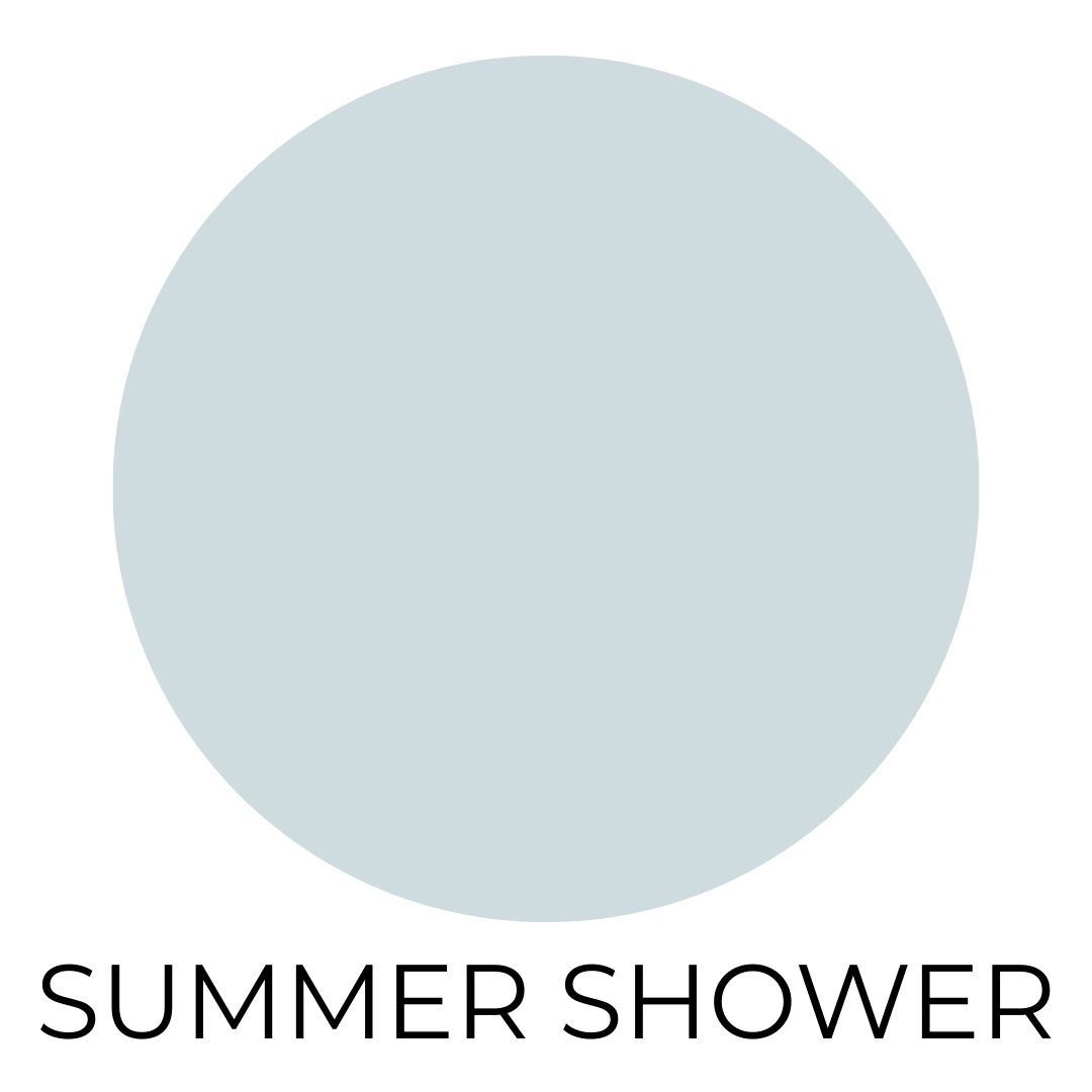 A soft, cool-toned light blue paint swatch labeled ‘Summer Shower’ displayed against a clean white background.