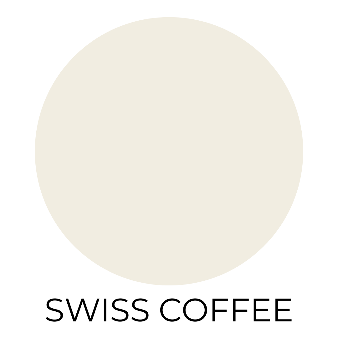 Benjamin Moore Swiss Coffee paint swatch. A soft, creamy warm white circle on a white background with the words “SWISS COFFEE” in bold, black letters below.