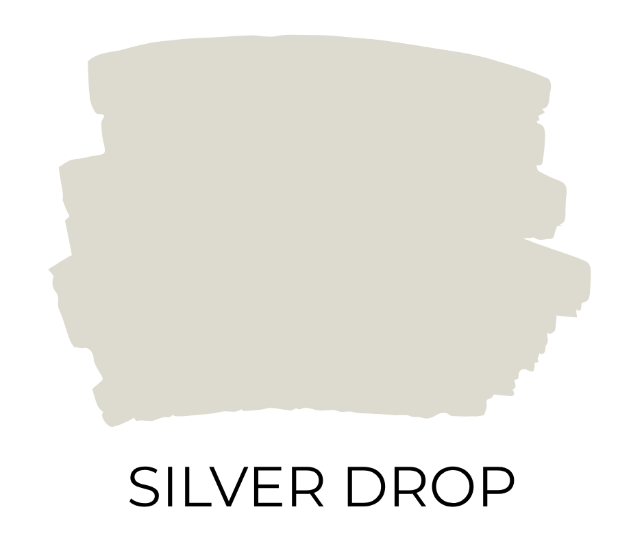Paint swatch sample of Behr Silver Drop, a bright light gray with a hint of green undertone.