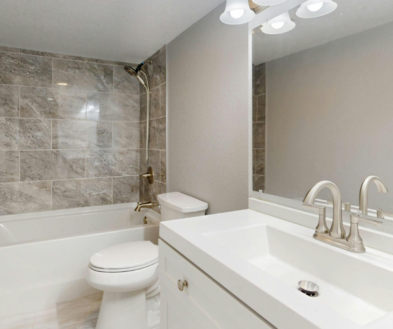 Small bathroom with light gray walls