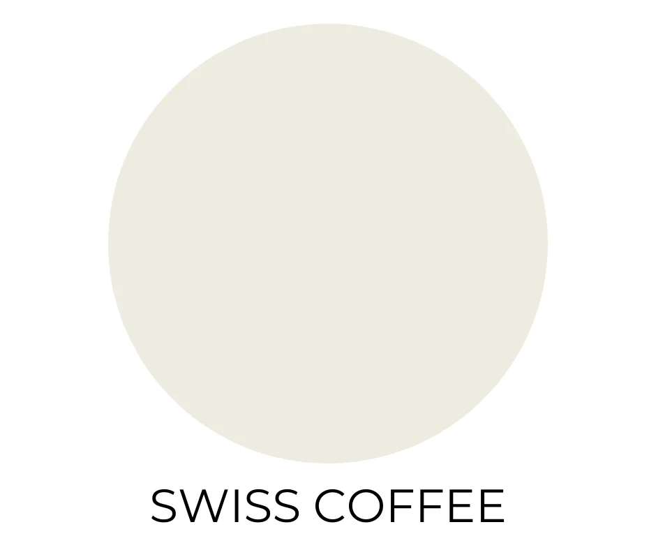 Warm white paint color for farmhouse labeled Swiss coffee.