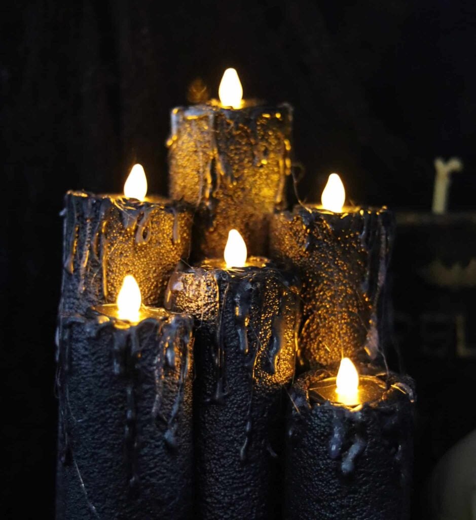 Easy diy Halloween decor pool noodle candles with tea lights.