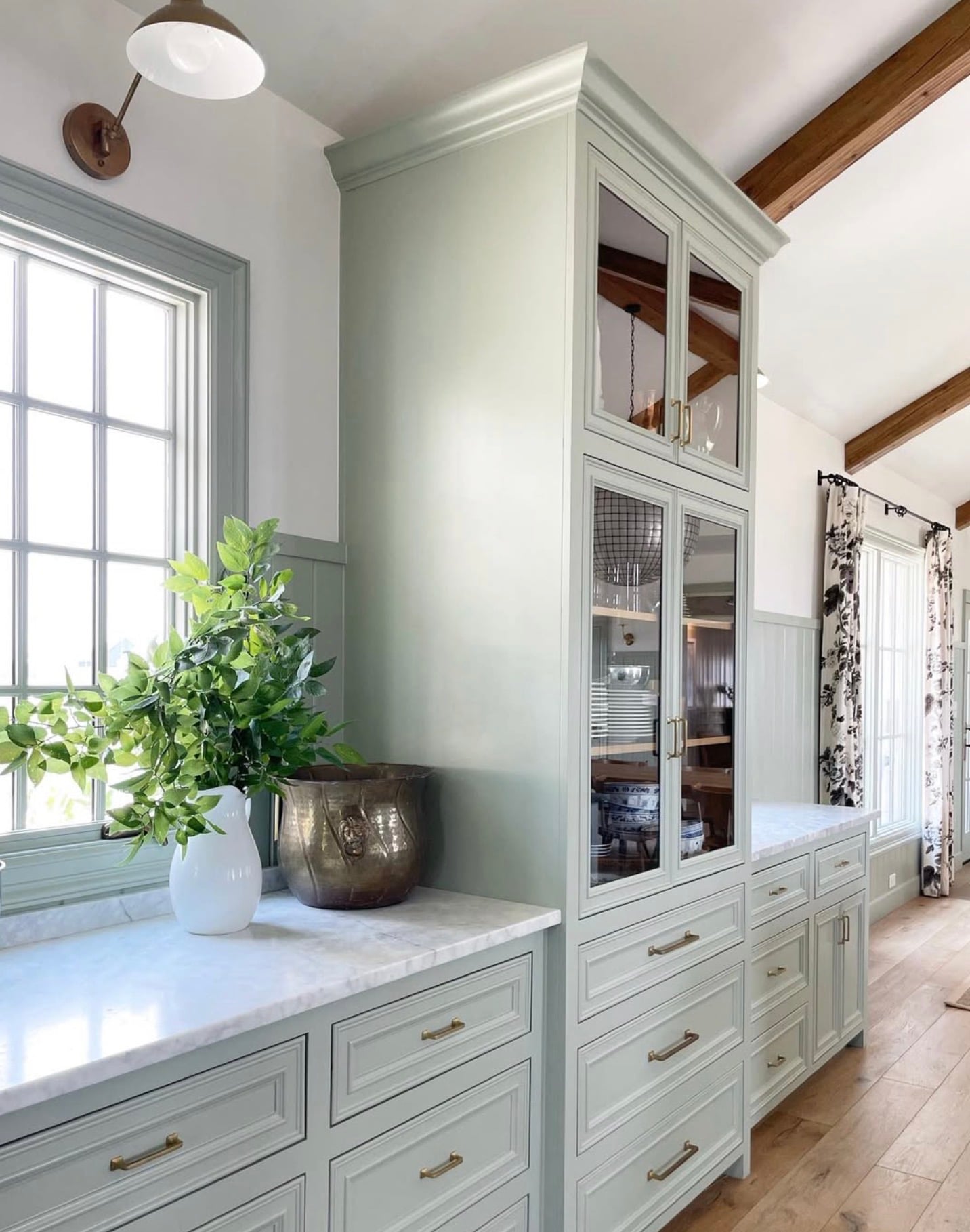 Kitchen cabinets painted in Benjamin Moore Saybrook Sage.